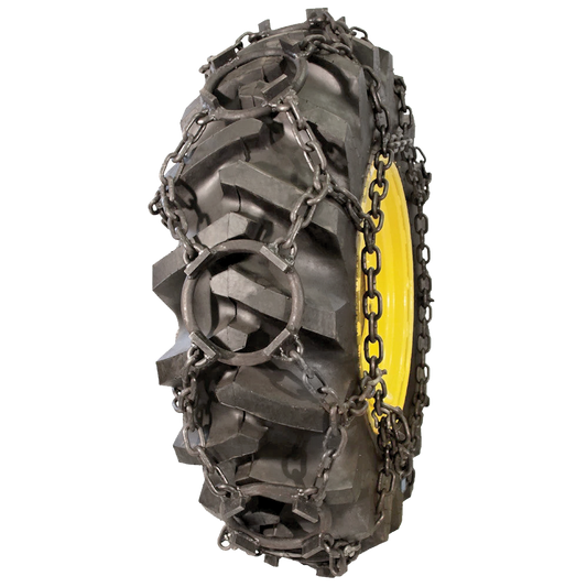 Bear Paw tire chain with heavy metal links fitted over a large treaded tire