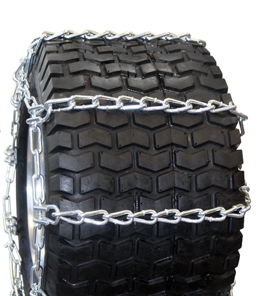 4-link twist-link tire chain fitted over a wide black lawn and garden tire
